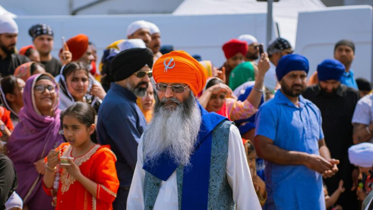 Sikh community gathering, showcasing traditional attire and vibrant cultural expressions.